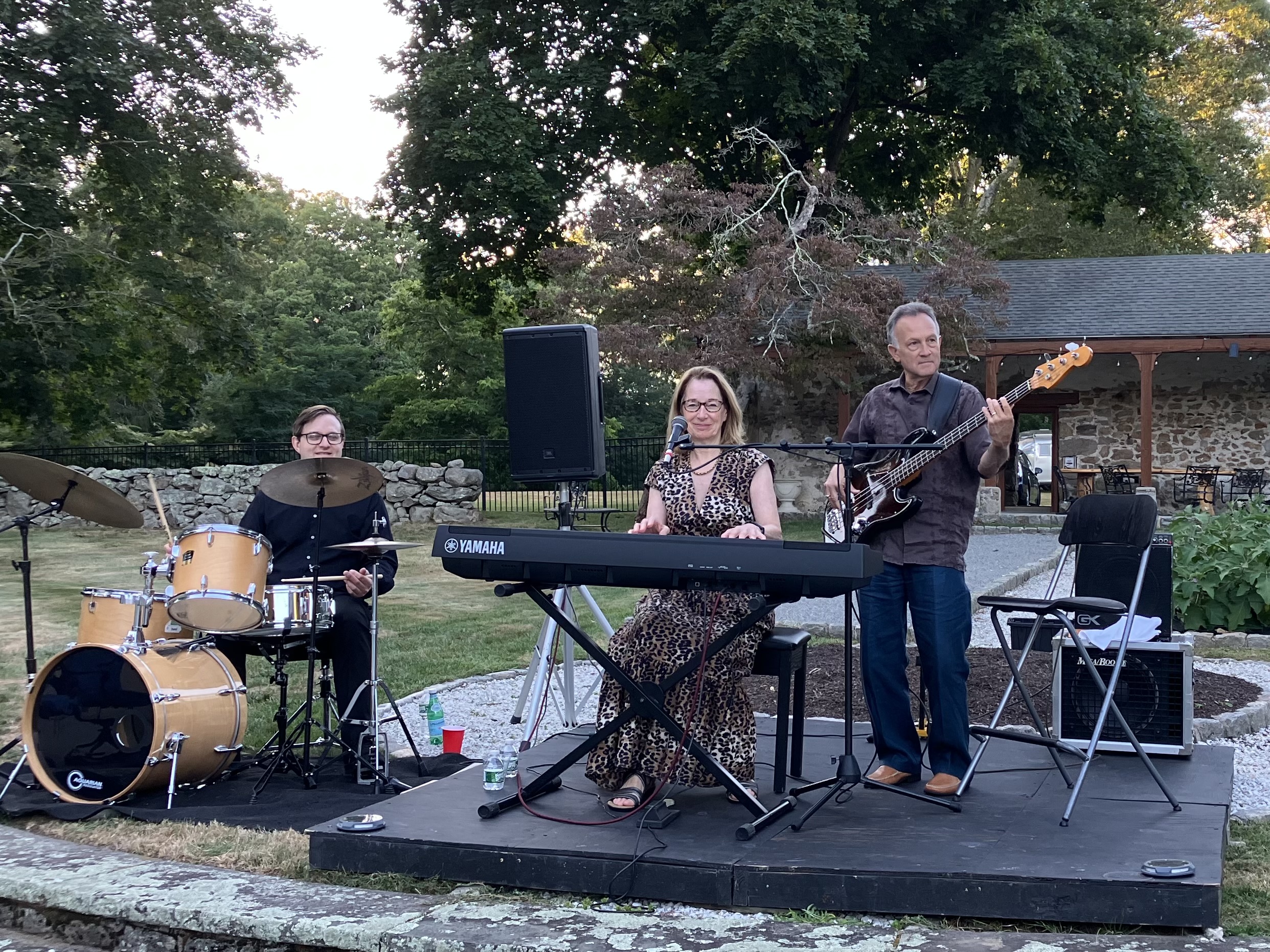 Debbie Sullivan performing with bassist Tom Charlap and her son, drummer Oscar Suchanek